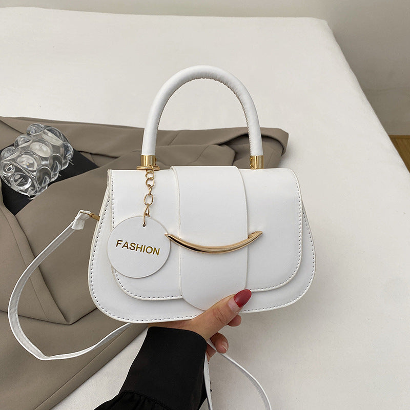 Polished Leather Top Handle Bag with Gold Hardware and Crossbody Strap