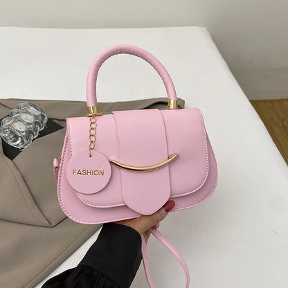 Polished Leather Top Handle Bag with Gold Hardware and Crossbody Strap