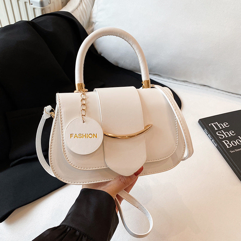 Polished Leather Top Handle Bag with Gold Hardware and Crossbody Strap