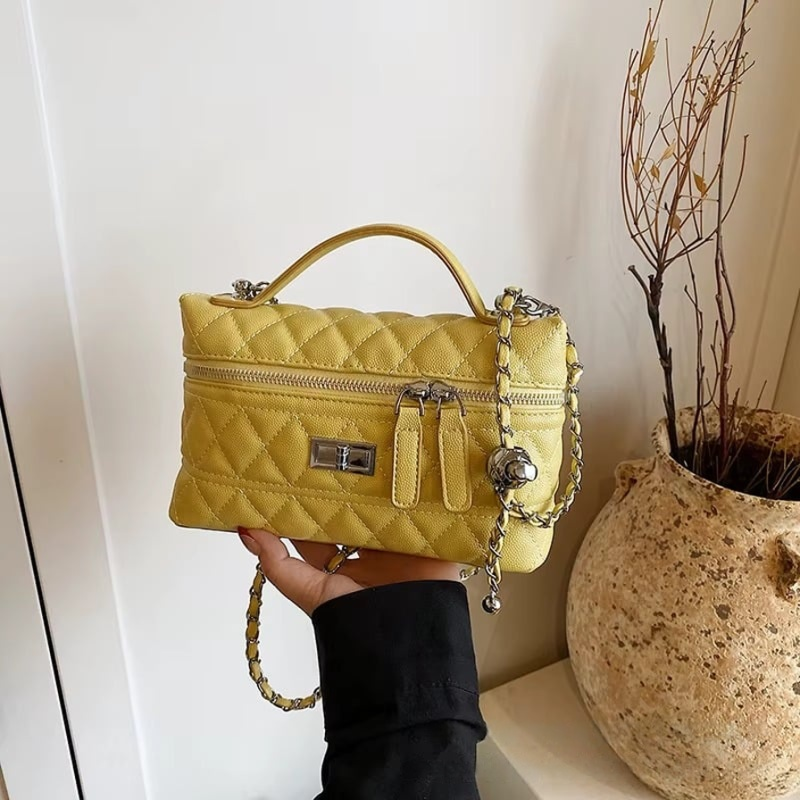 Quilted Leather Top Handle Bag with Chain Strap and Turn-Lock Closure