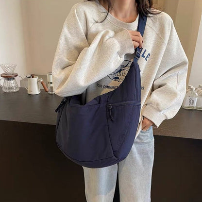 Relaxed Puffer Shoulder Bag with Adjustable Strap and Zip Pockets