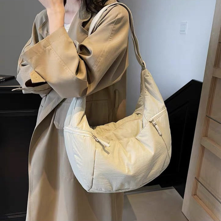 Relaxed Puffer Shoulder Bag with Adjustable Strap and Zip Pockets