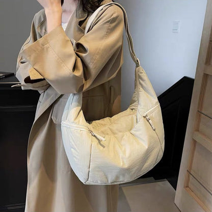 Relaxed Puffer Shoulder Bag with Adjustable Strap and Zip Pockets