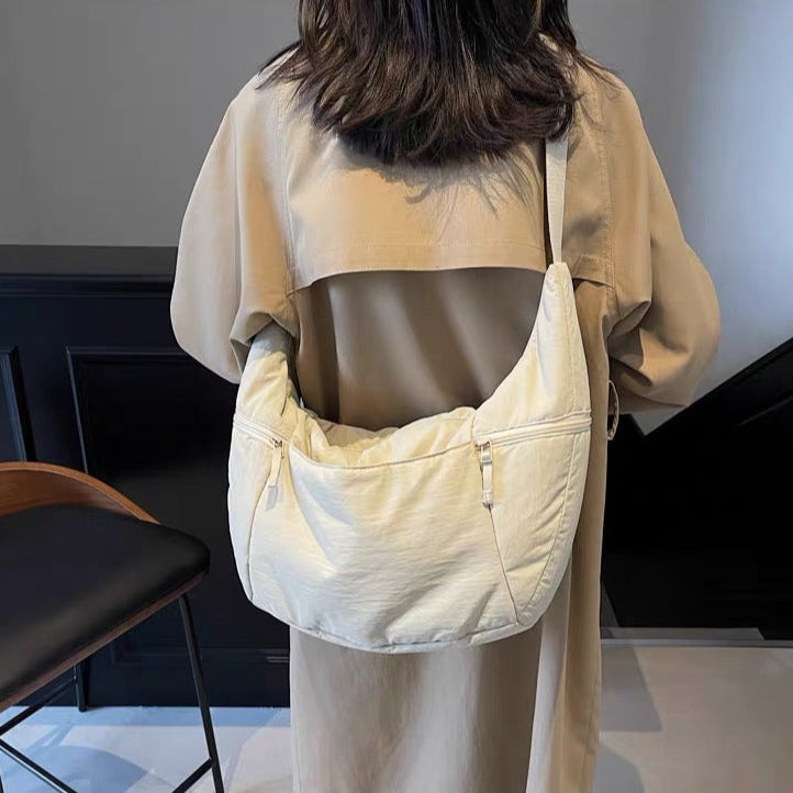 Relaxed Puffer Shoulder Bag with Adjustable Strap and Zip Pockets