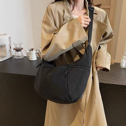 Relaxed Puffer Shoulder Bag with Adjustable Strap and Zip Pockets