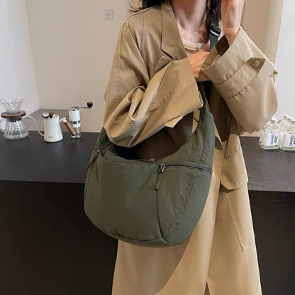 Relaxed Puffer Shoulder Bag with Adjustable Strap and Zip Pockets