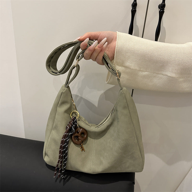 Relaxed Suede Shoulder Bag with Charm Key Pendant