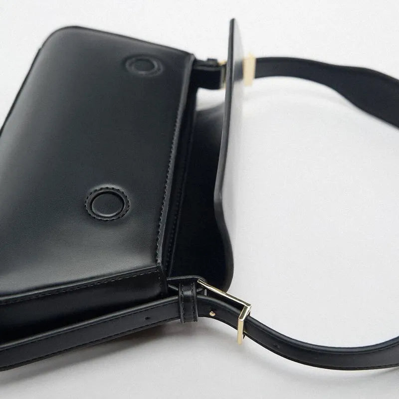 Sleek Leather Shoulder Bag with Flap Closure