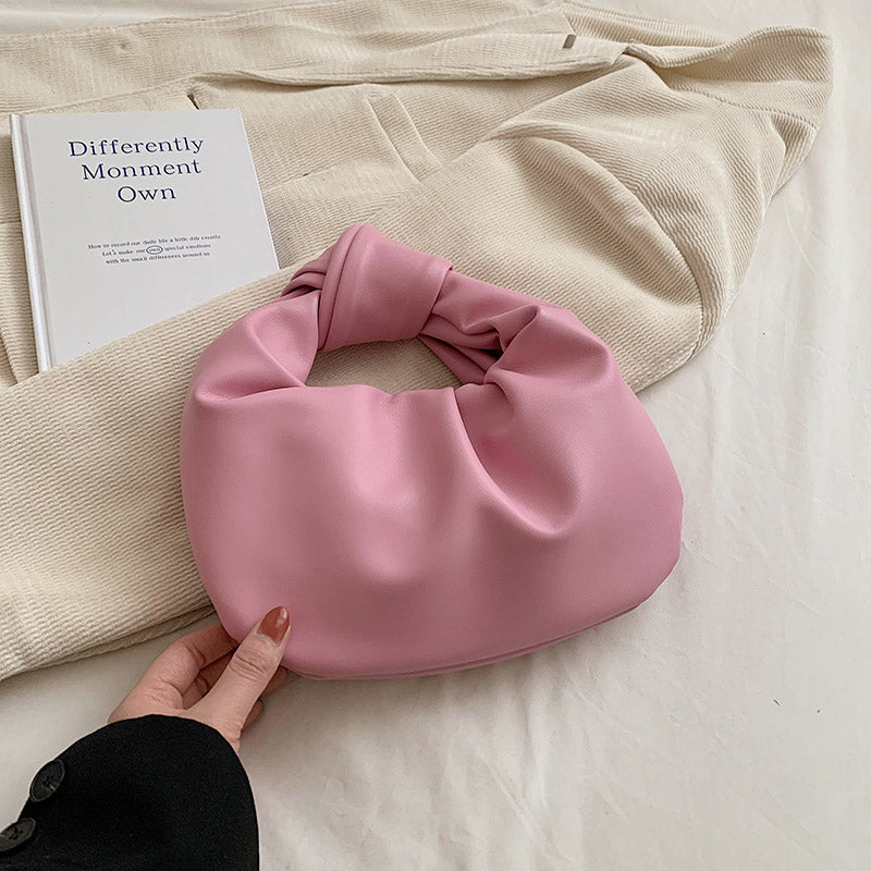 Sleek Leather Shoulder Bag with Knotted Handle and Gathered Body