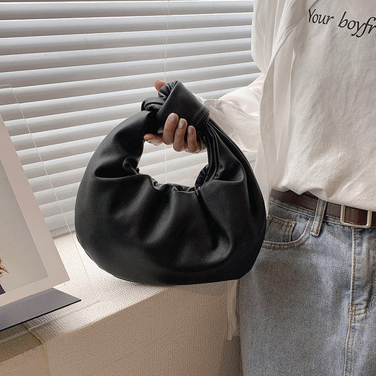 Sleek Leather Shoulder Bag with Knotted Handle and Gathered Body