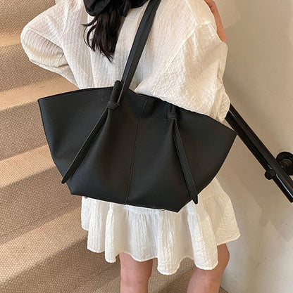 Sleek Leather Tote Bag with Knot Strap Detail