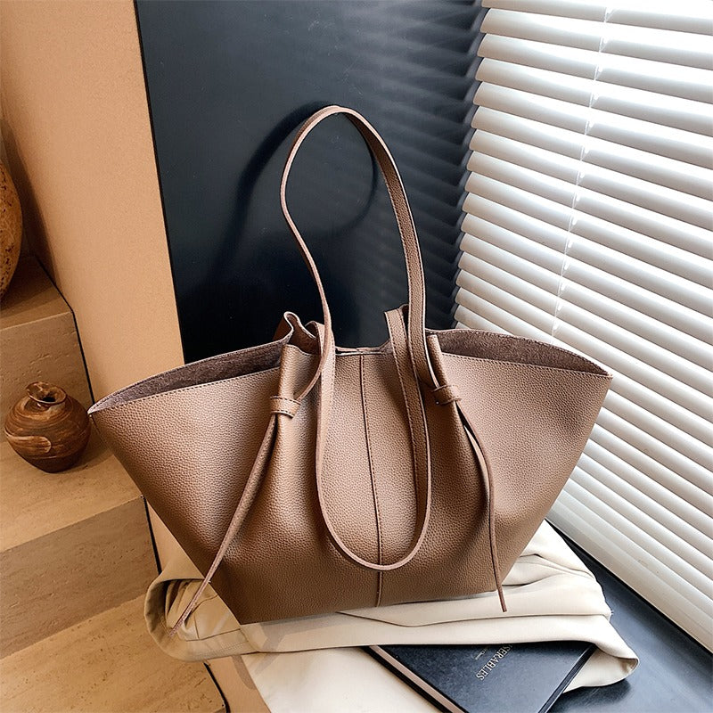 Sleek Leather Tote Bag with Knot Strap Detail