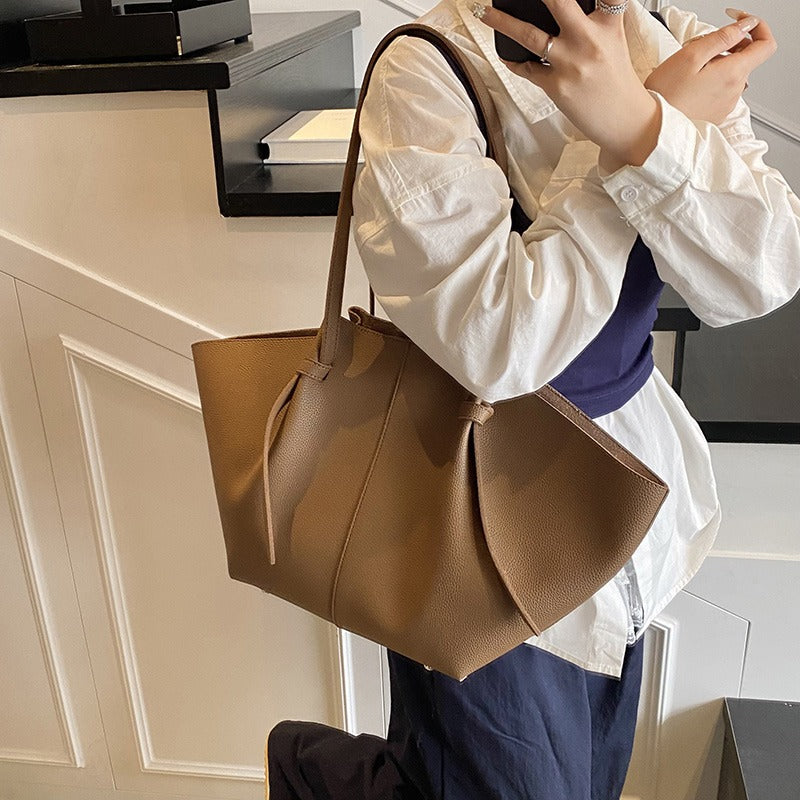 Sleek Leather Tote Bag with Knot Strap Detail