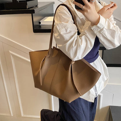 Sleek Leather Tote Bag with Knot Strap Detail