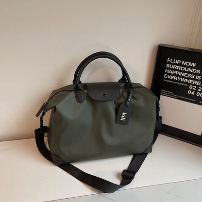 Sleek Leather Weekend and Travel Bag with Detachable Shoulder Strap