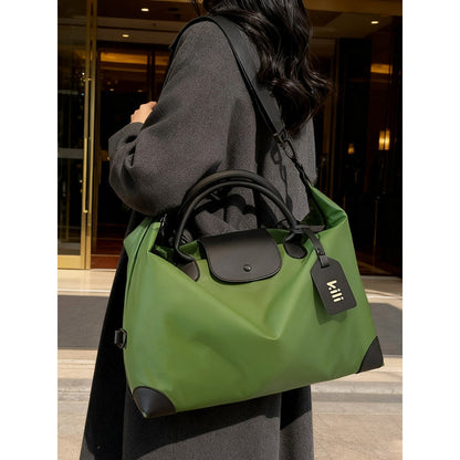 Sleek Leather Weekend and Travel Bag with Detachable Shoulder Strap