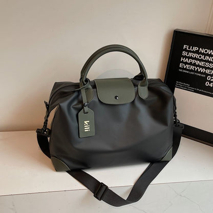 Sleek Leather Weekend and Travel Bag with Detachable Shoulder Strap