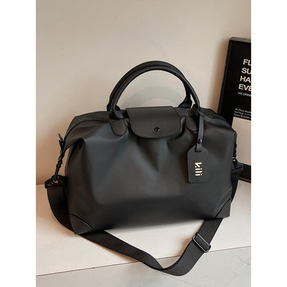 Sleek Leather Weekend and Travel Bag with Detachable Shoulder Strap