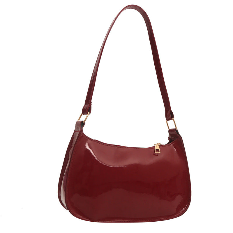 Sleek Patent Leather Shoulder Bag with Gold Hardware