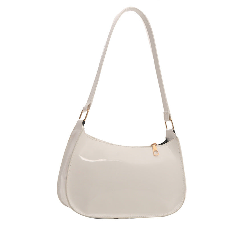 Sleek Patent Leather Shoulder Bag with Gold Hardware