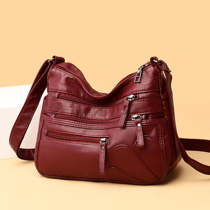 Soft Leather Crossbody Bag with Multiple Zip Pockets