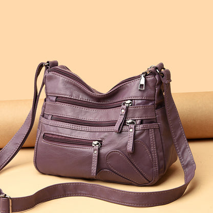 Soft Leather Crossbody Bag with Multiple Zip Pockets