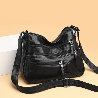 Soft Leather Crossbody Bag with Multiple Zip Pockets