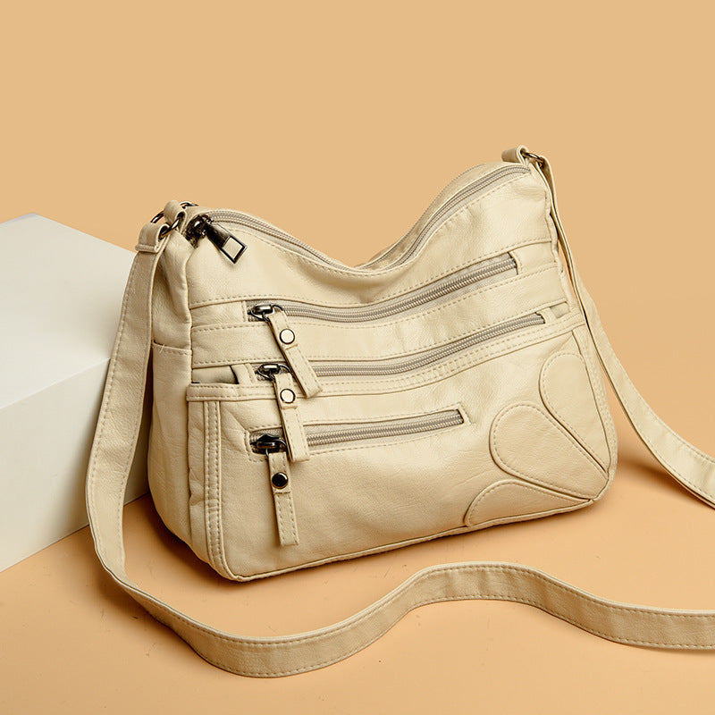 Soft Leather Crossbody Bag with Multiple Zip Pockets