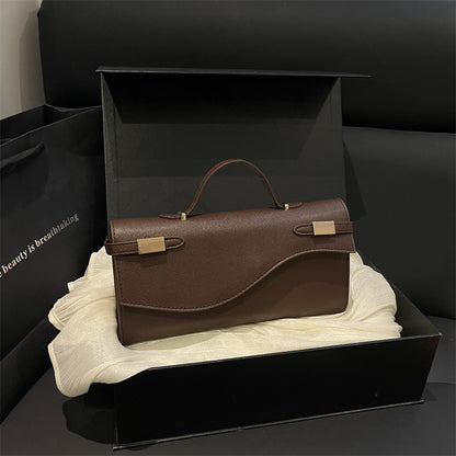 Structured Leather Shoulder Bag with Wave Flap and Gold Hardware