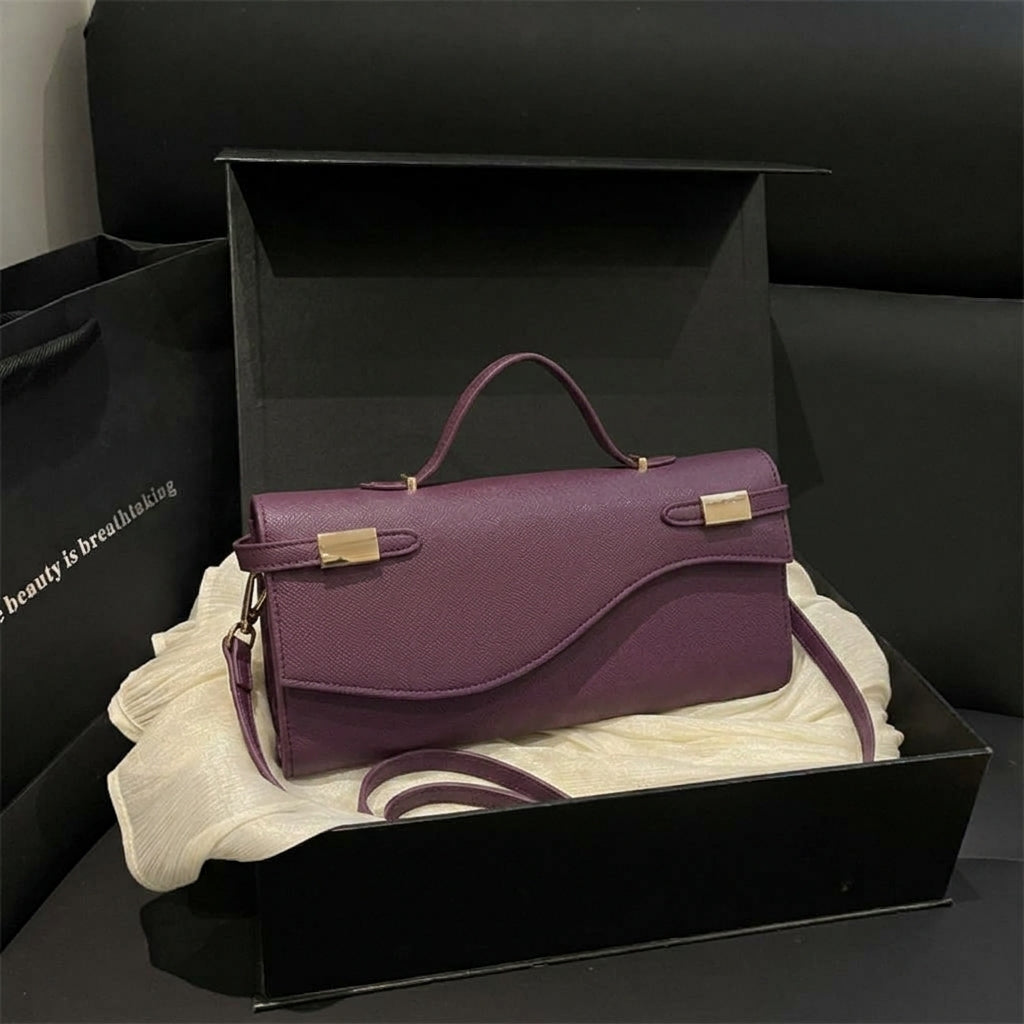 Structured Leather Shoulder Bag with Wave Flap and Gold Hardware