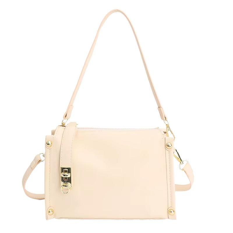 Suede Crossbody Bag with Gold Lock and Stud Detail