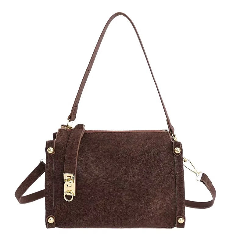Suede Crossbody Bag with Gold Lock and Stud Detail