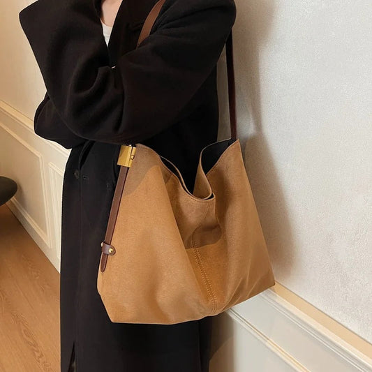 Suede Shoulder Bag with Gold Lock Detail and Snap Closure