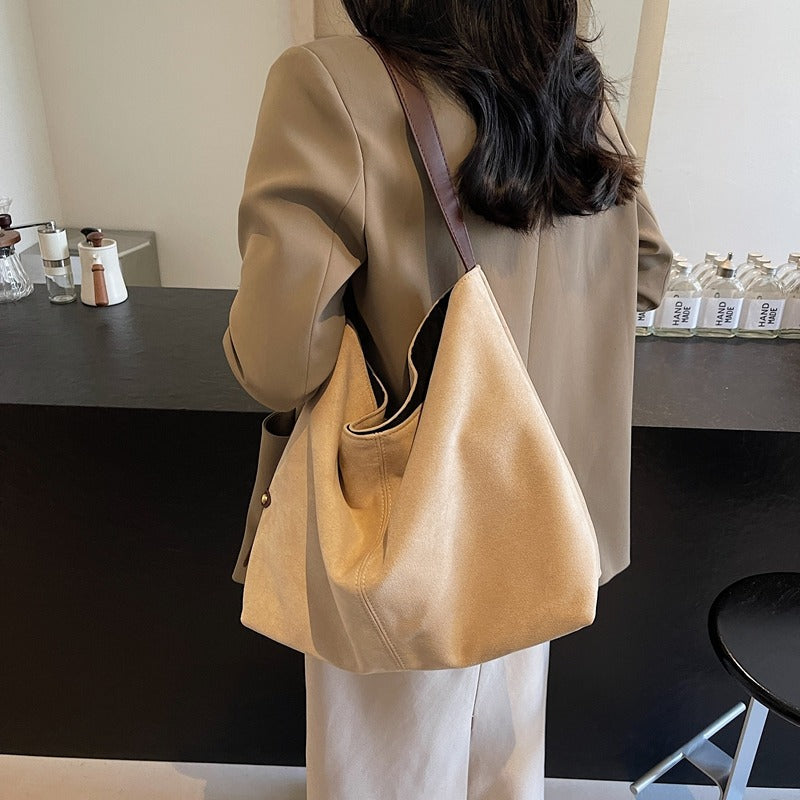 Suede Shoulder Bag with Gold Lock Detail and Snap Closure